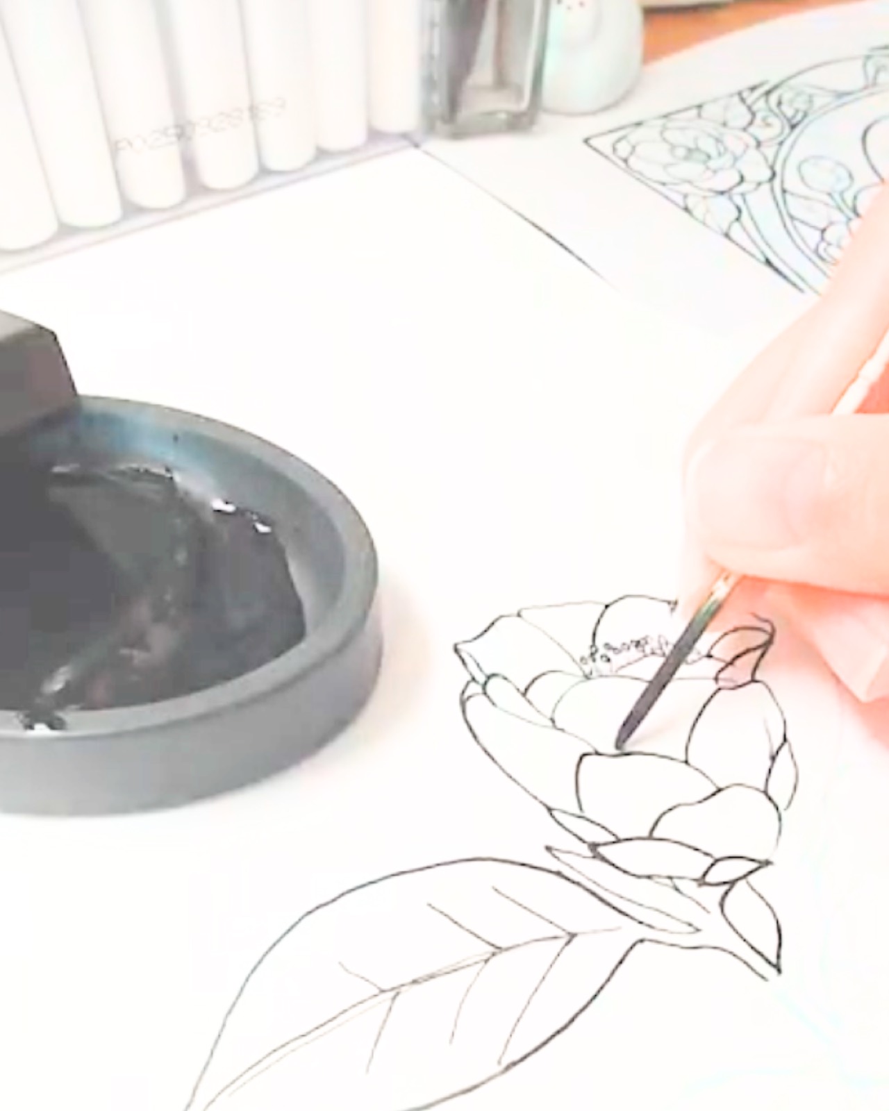 Drawing a camellia by hand with a wooden toothpick and Sumi ink
